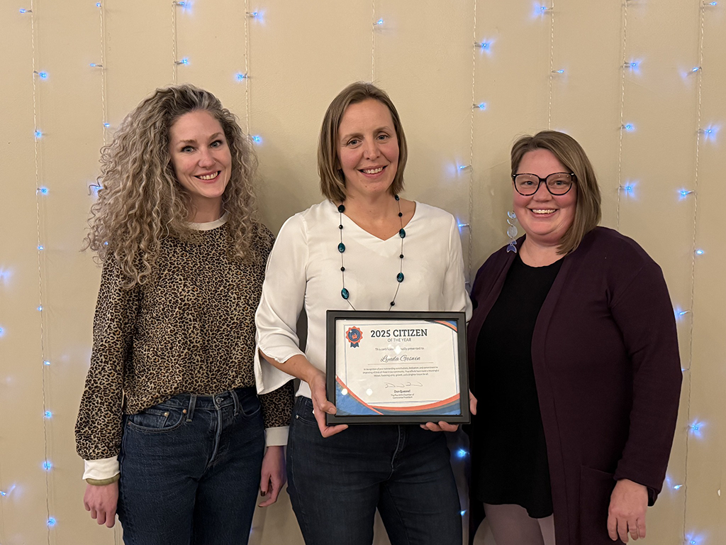 Lynda Geswin and her support team with her citizen of the year award for 2025.