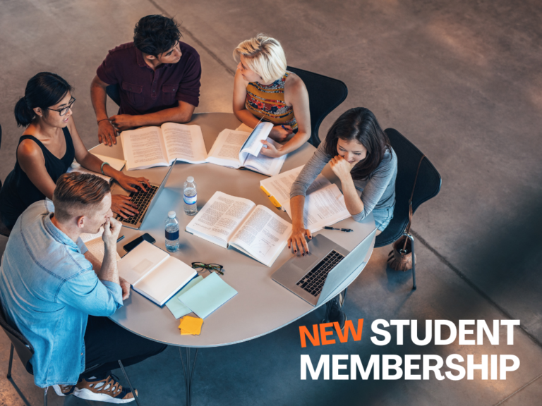 College students working together around a campus table