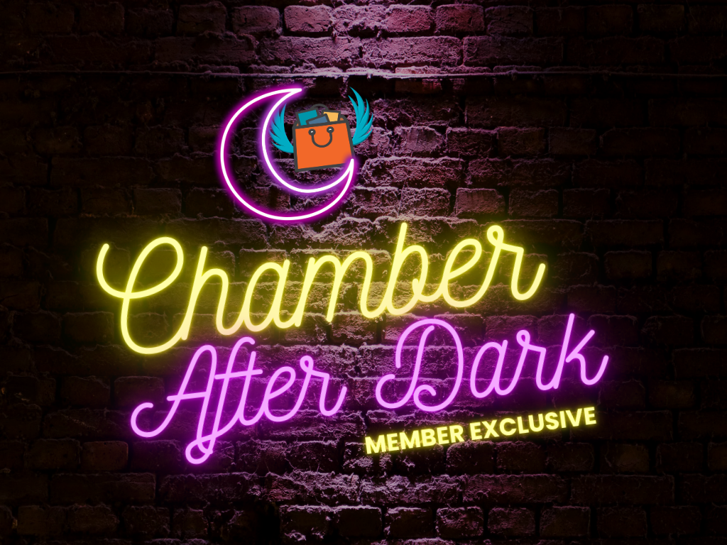 Night lit brick wall highlighting the neon glow for the event title "Chamber After Dark — Member Exclusive"