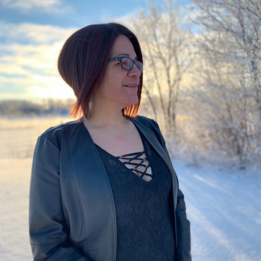 Paywahpun Martin Chamber Director PBDC, standing outside in winter, looking into the distance